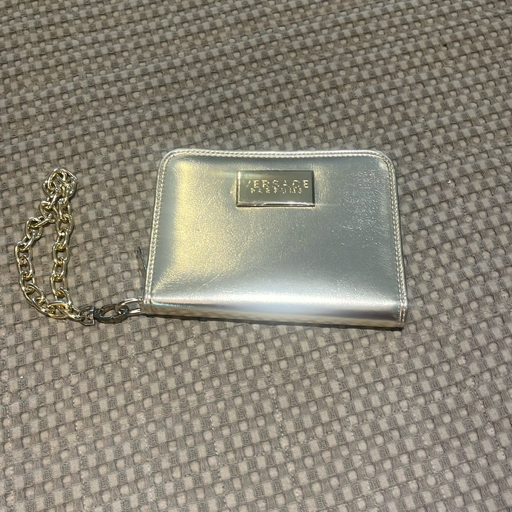 Versace chained wrist bag.